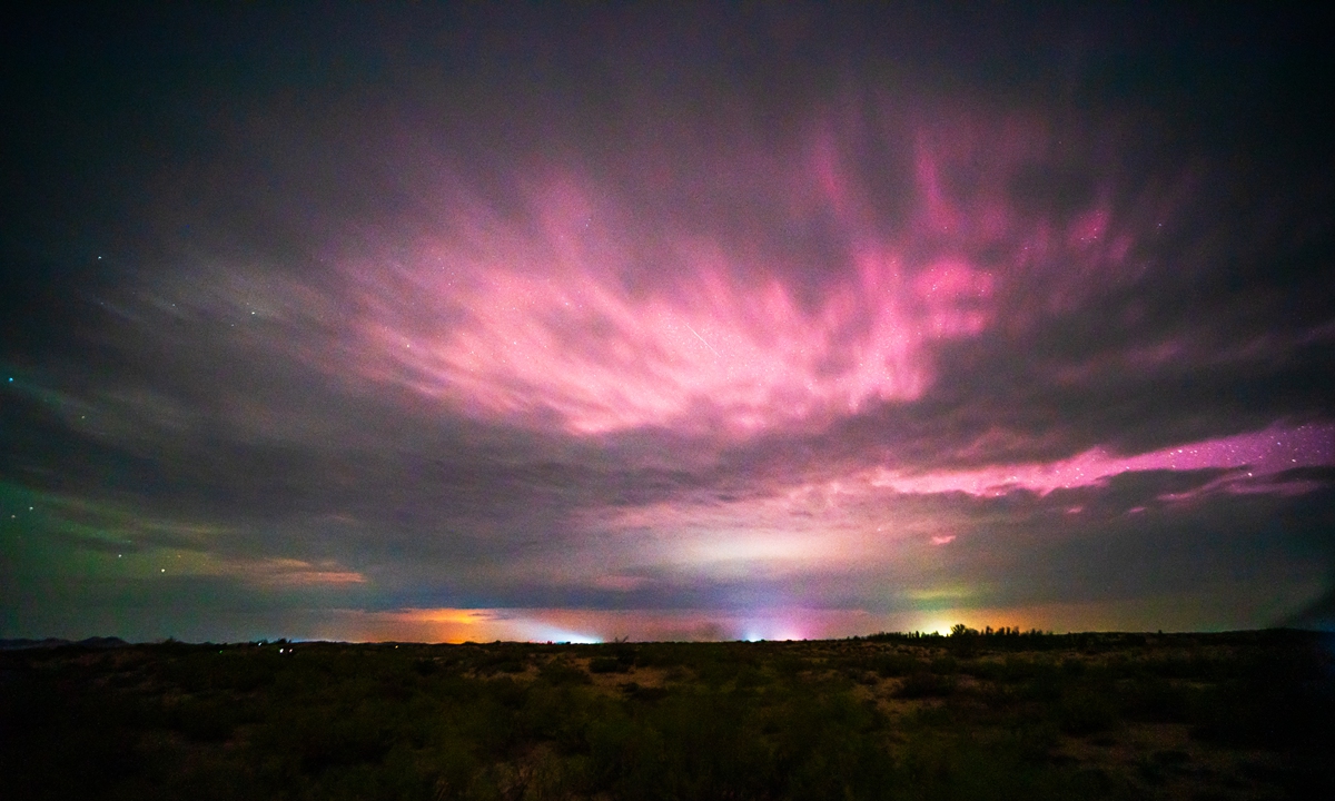 An aurora is seen on the outskirts of Chifeng city, Inner Mongolia Autonomous Region, May 11, 2024. Photo: VCG